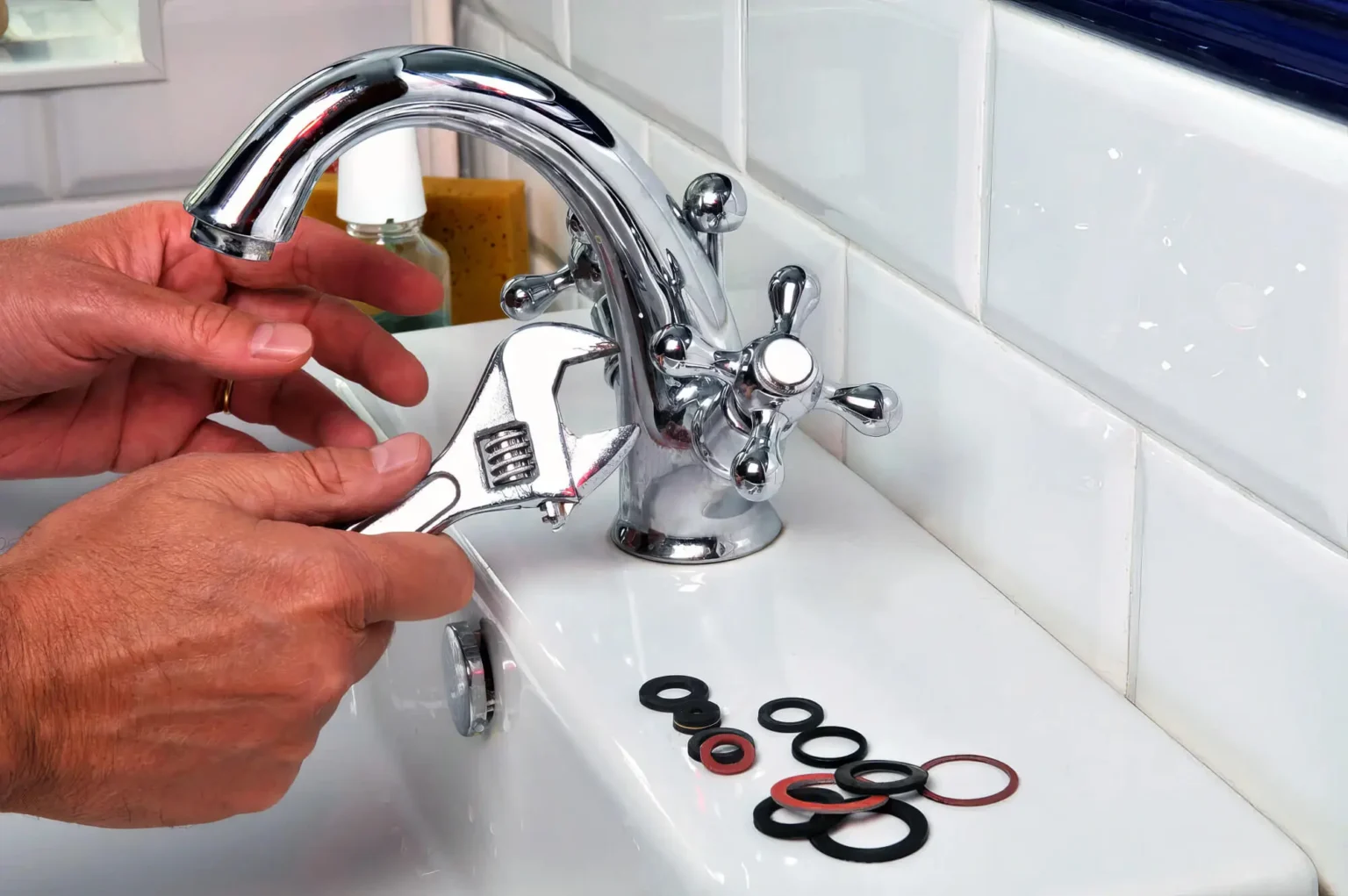 Plumber maintaining a bathroom faucet in Millbrae